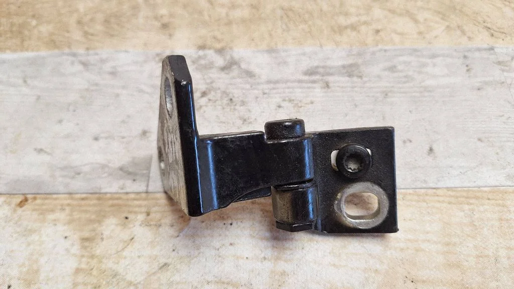Front door upper hinge 1K083140