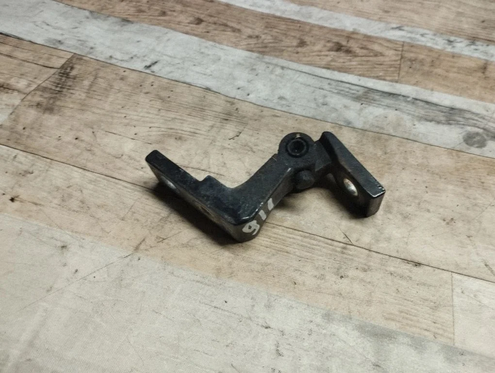 Front door upper hinge – front left