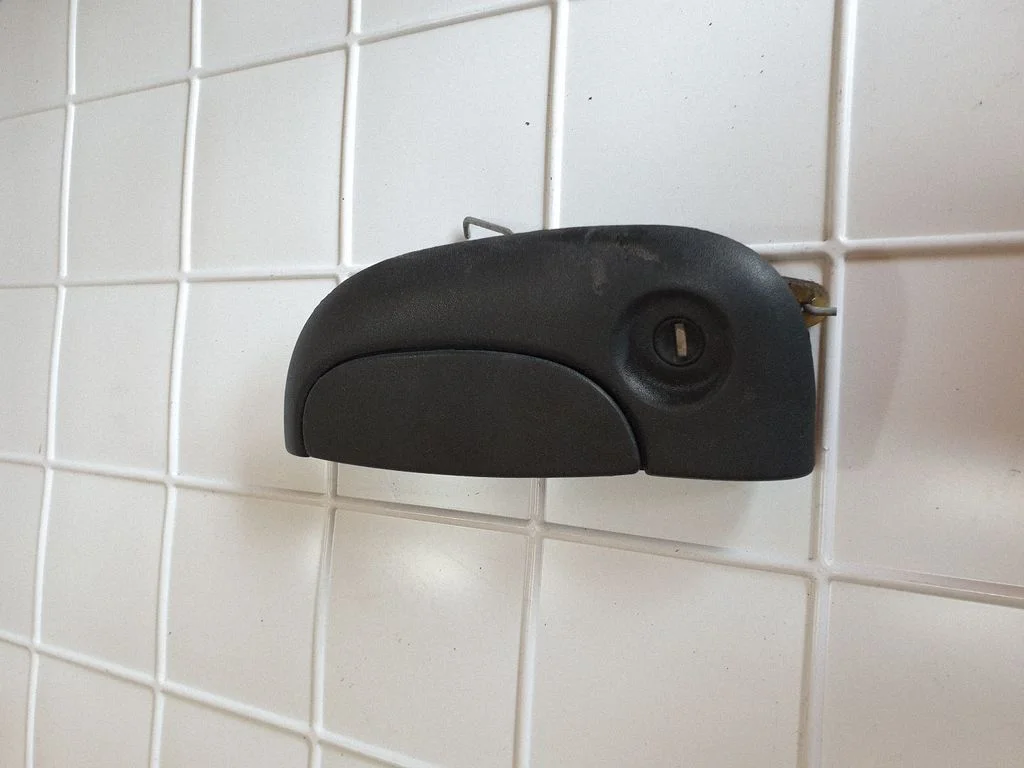 Klamka zewnętrzna drzwi przednich 7700354478