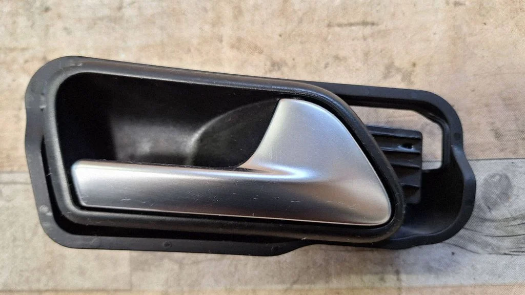 Front door interior handle 1T0837198A