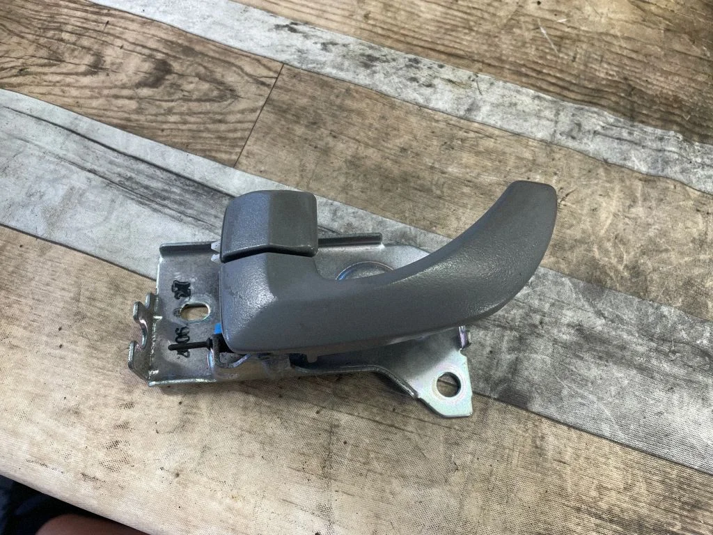 Front door interior handle – front left