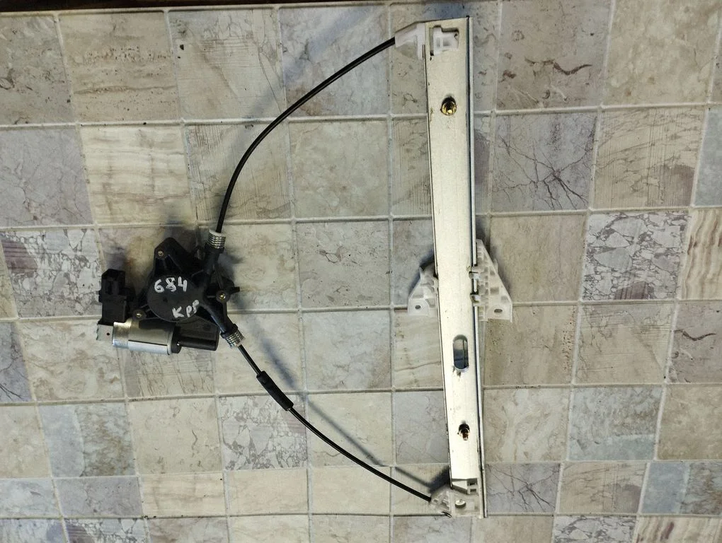 Front door window regulator with motor GJ6A5958X