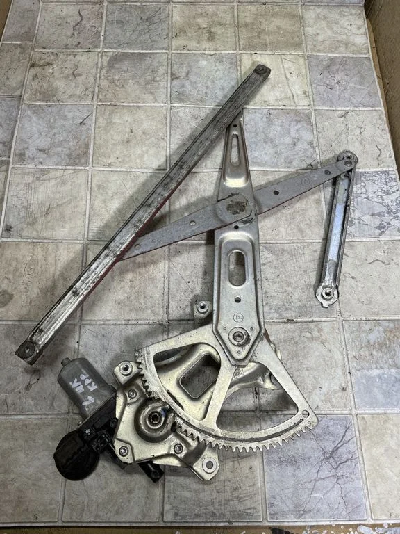 Front door window regulator with motor 8572058010
