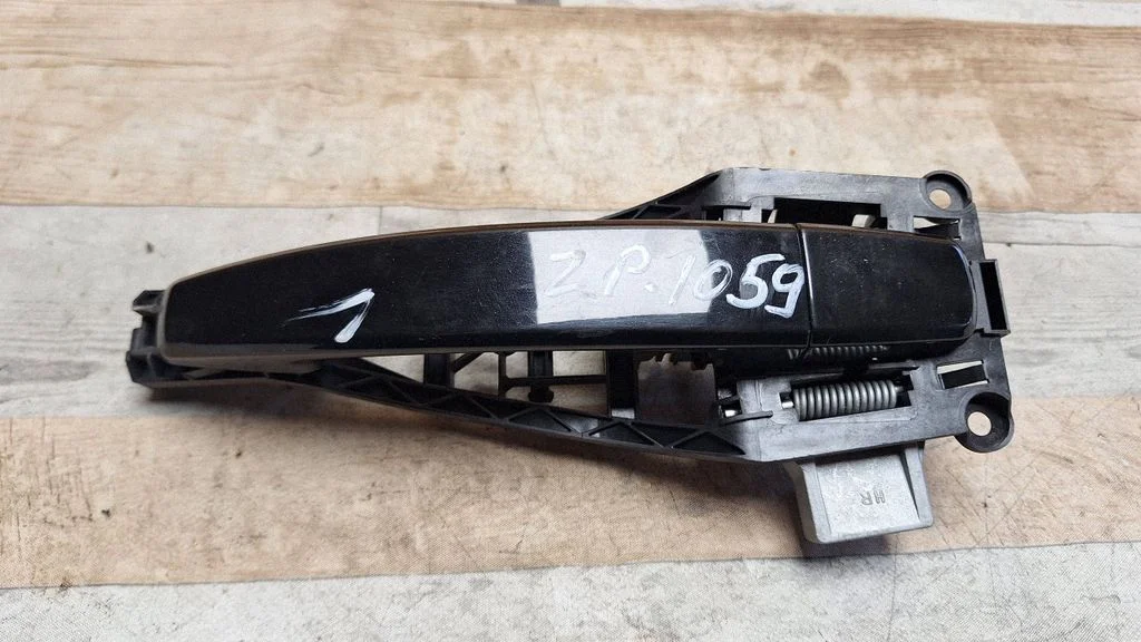 Rear door exterior handle 24463750