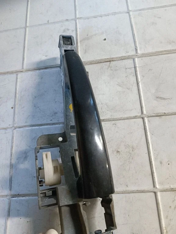 Aizmugurējo durvju ārējais atvēršanas rokturis 9653401580