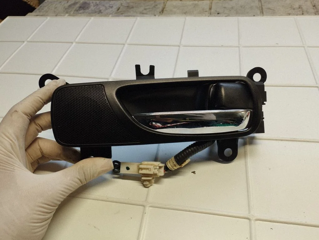 Rear door interior handle 6773053010