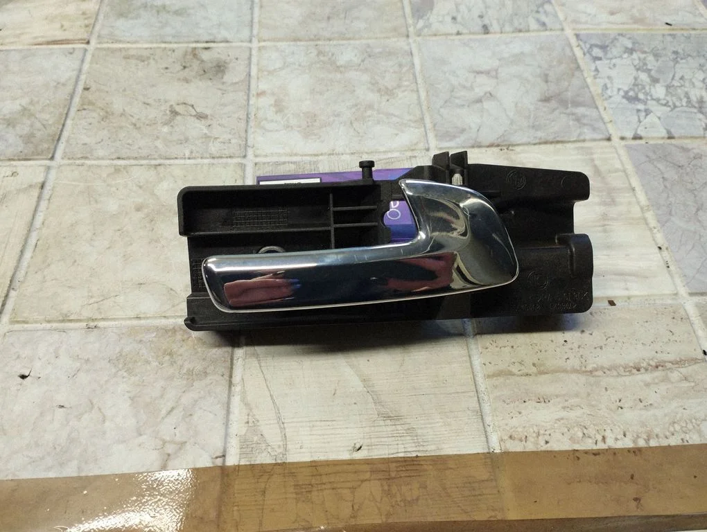 Rear door interior handle