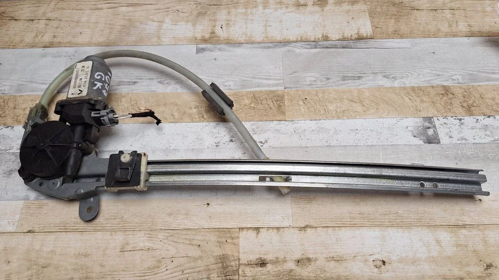 Rear door window regulator with motor 8200000557