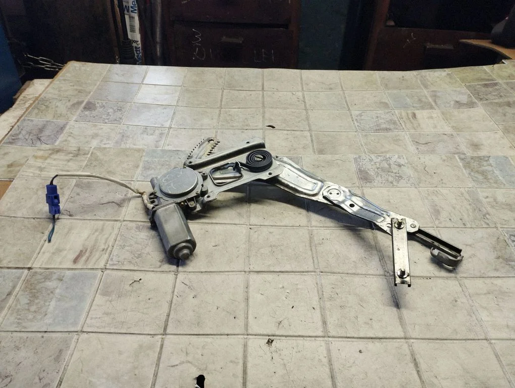 Rear door window regulator with motor – rear left