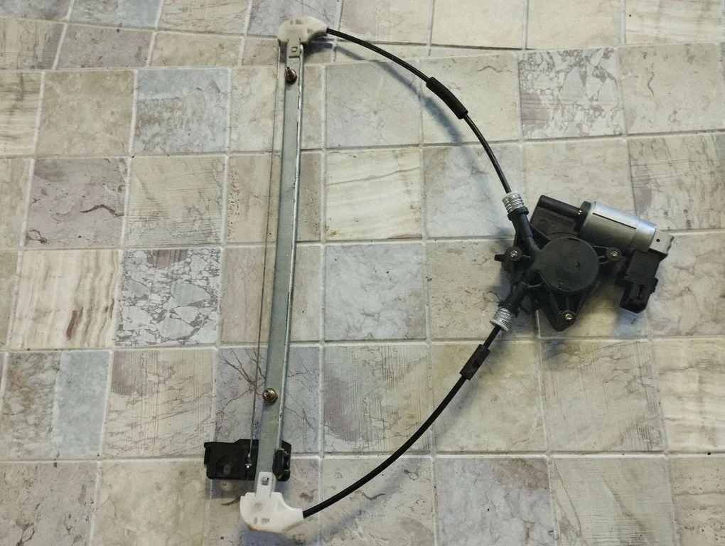 Rear door window regulator with motor GJ6A5958X