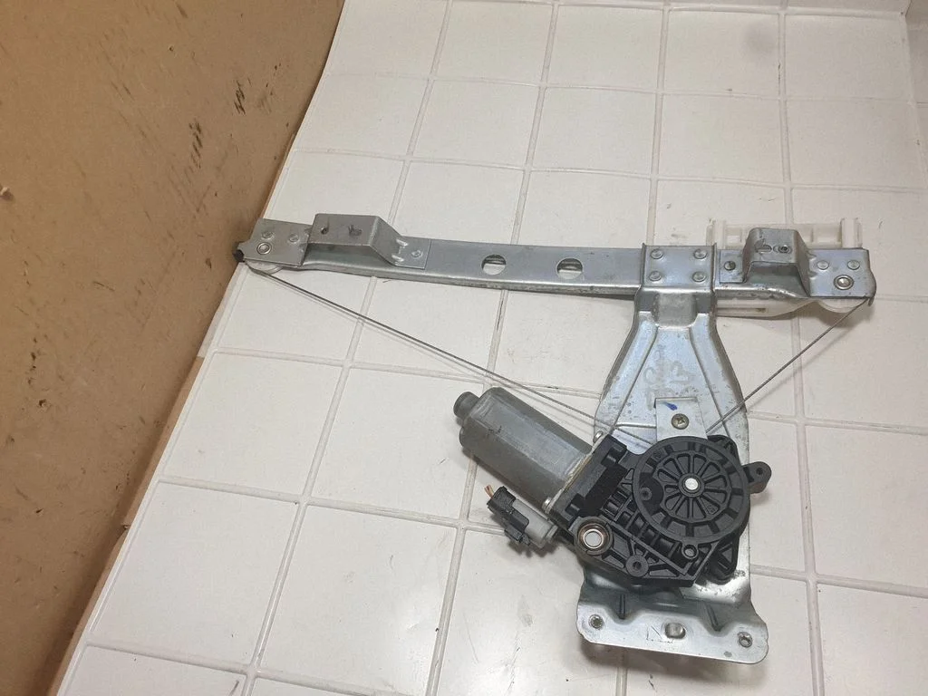 Rear door window regulator with motor 9653445280