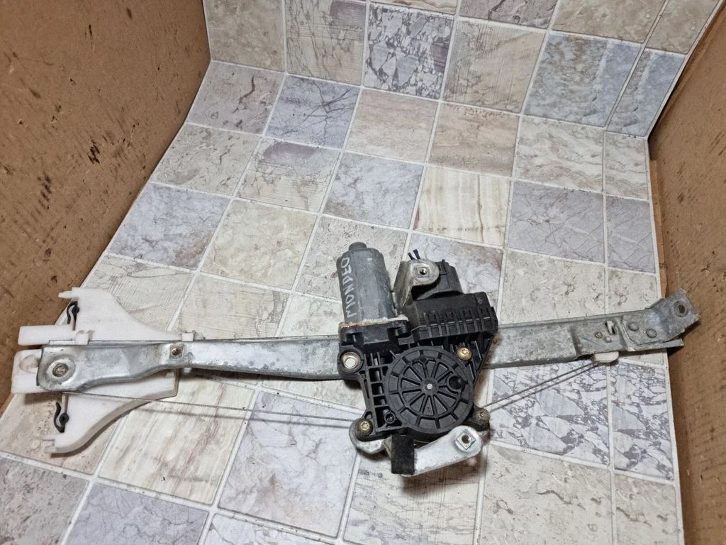 Rear door window regulator with motor 0130821772