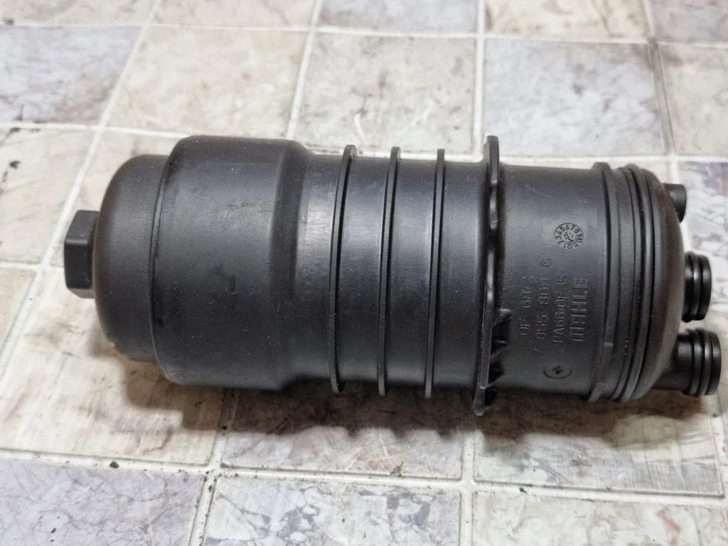 Oil filter mounting bracket
