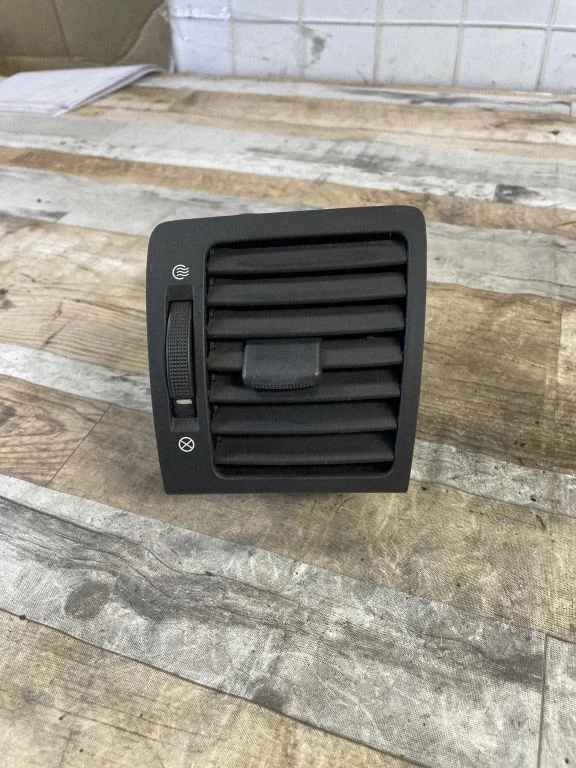 Dash center air vent grill 974803E000