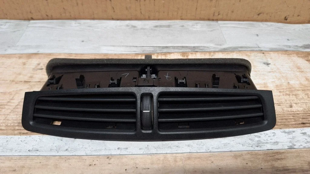 Dash center air vent grill