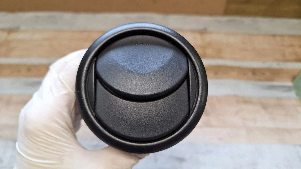 Dash center air vent grill – front right