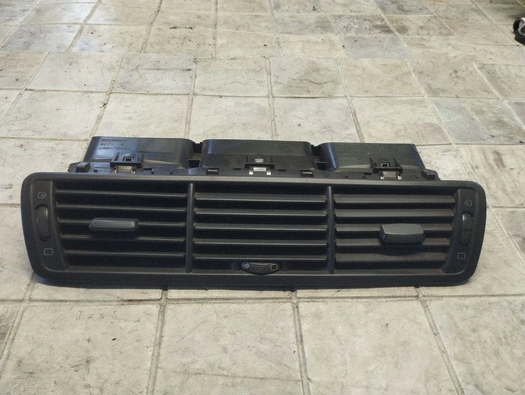 Dash center air vent grill