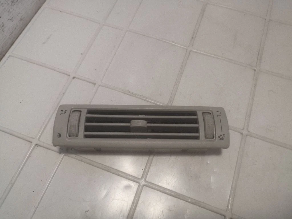 Dash center air vent grill 7D0820951A
