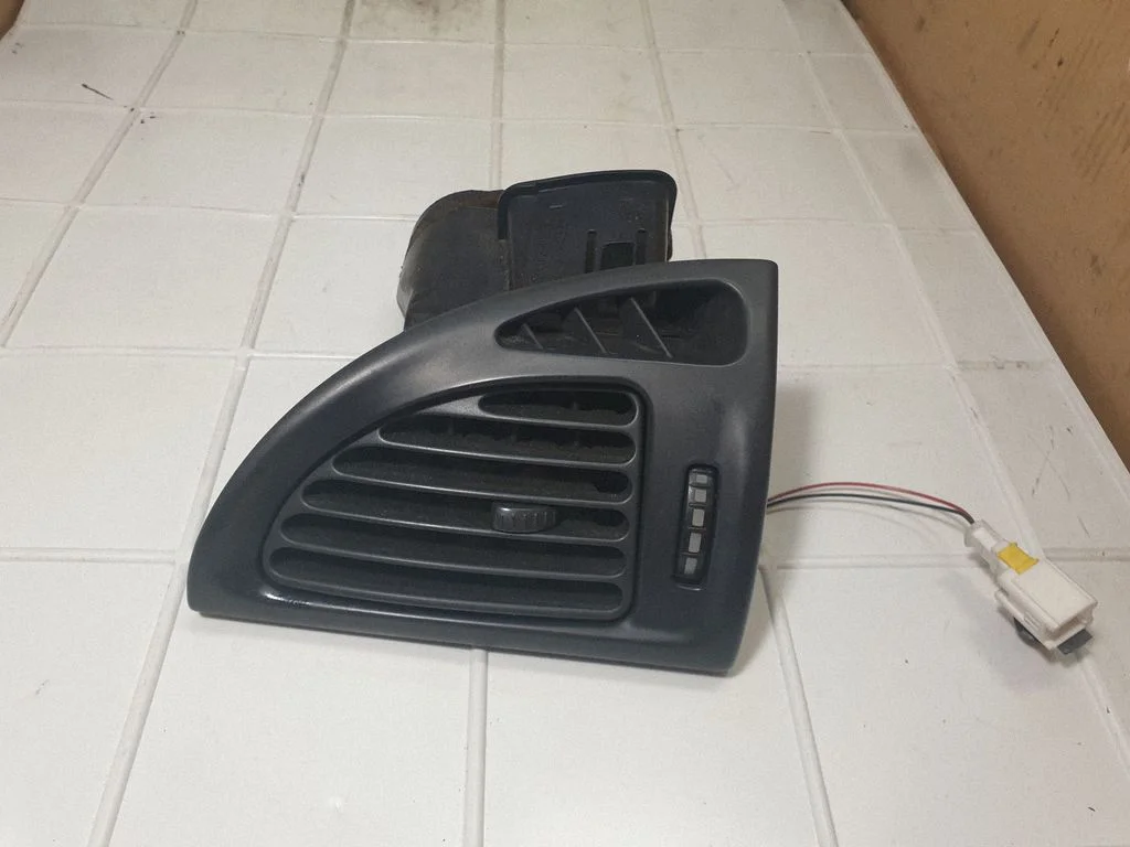 Dashboard side air vent grill/cover trim 99024210
