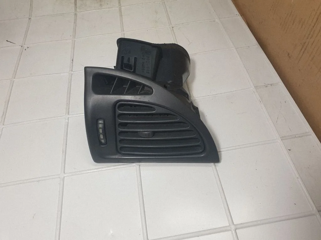 Dashboard side air vent grill/cover trim 99024110