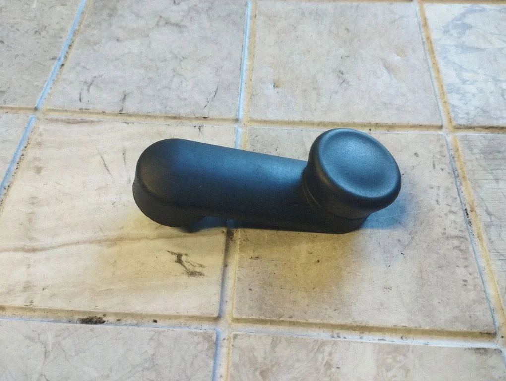 Rear door window winding handle 24451526