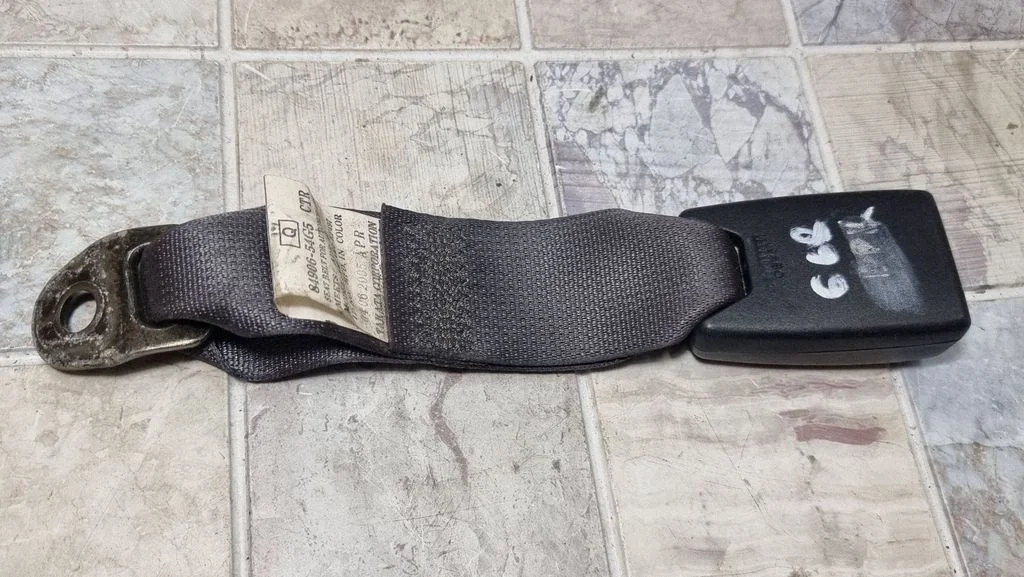 Rear seatbelt buckle 8490654G5