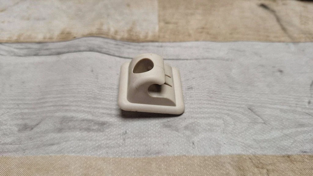 Sun visor clip/hook/bracket