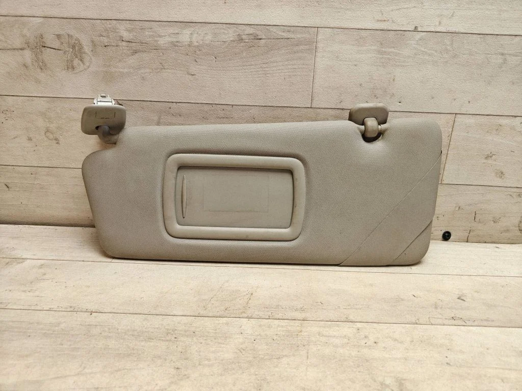 Sun visor – left