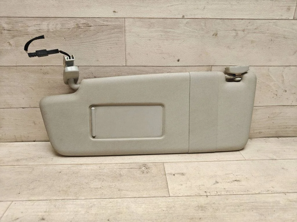 Sun visor – left