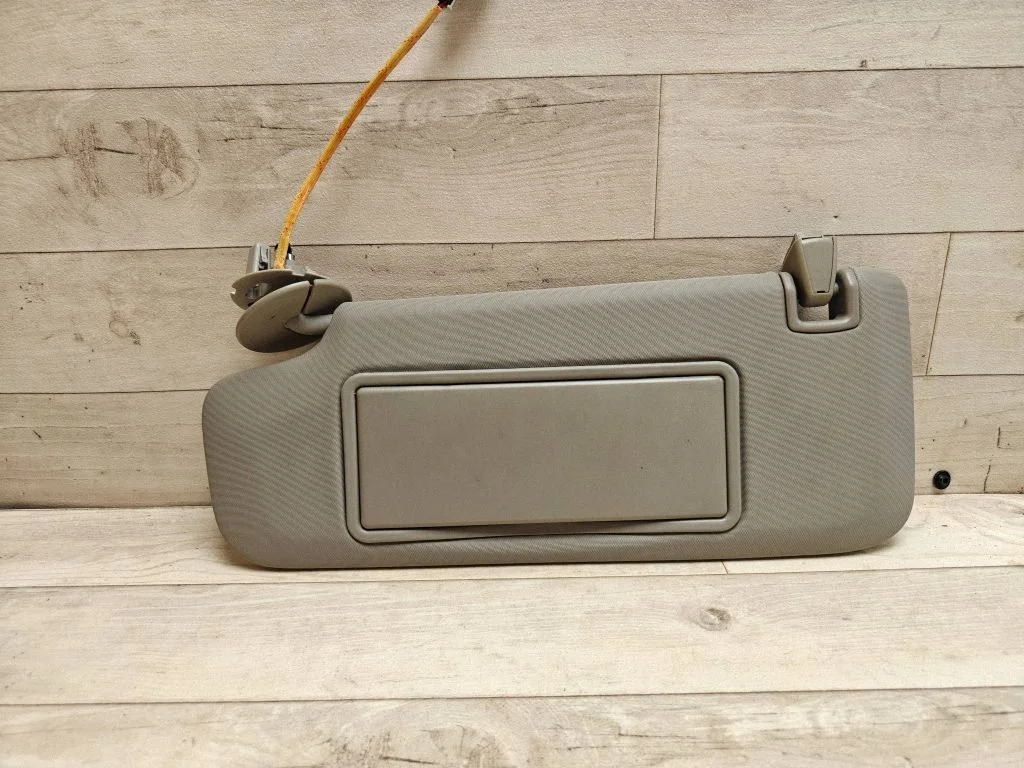 Sun visor – left
