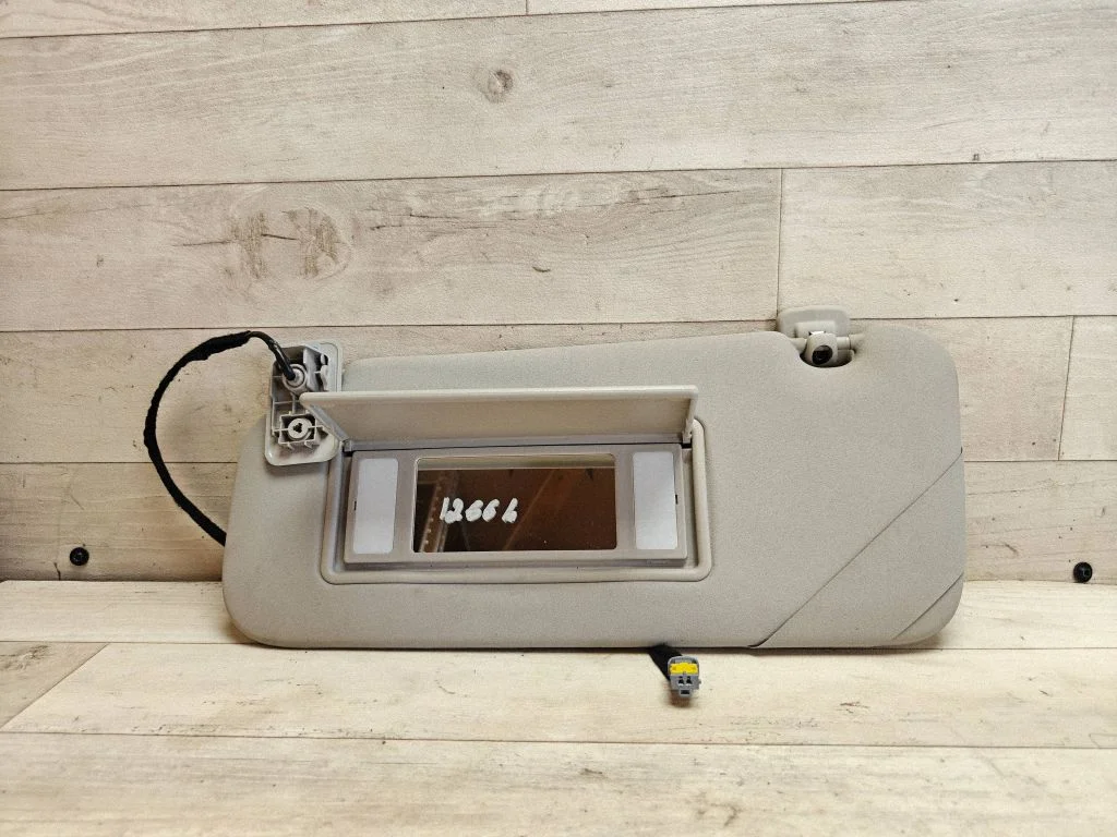 Sun visor – left