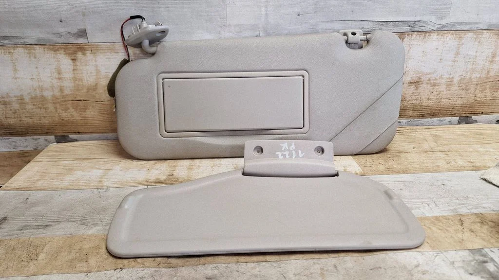 Sun visor – left