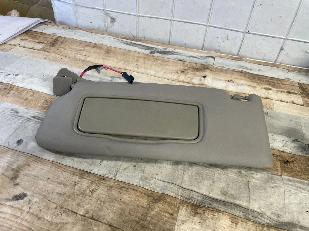 Sun visor – left