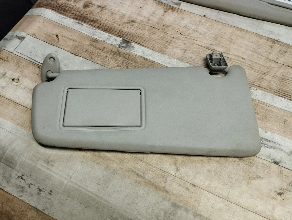 Sun visor – left
