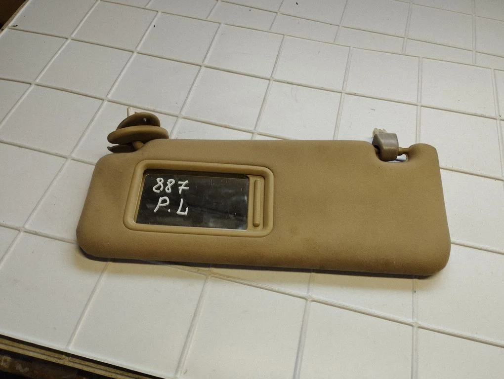 Sun visor – left