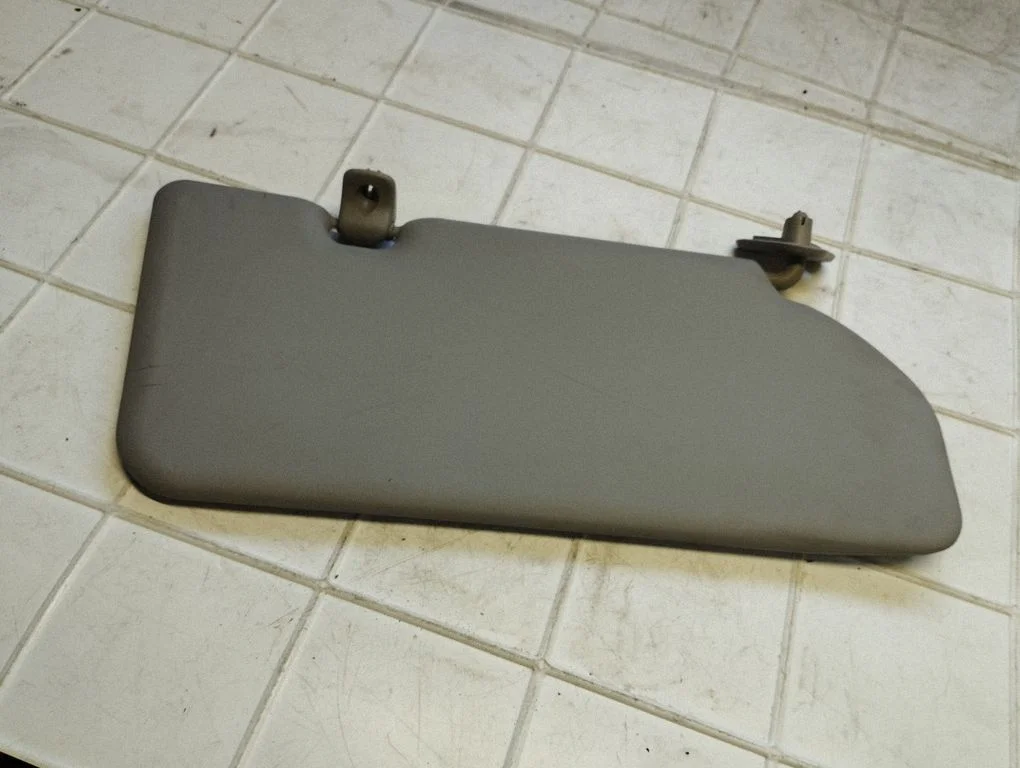 Sun visor – left