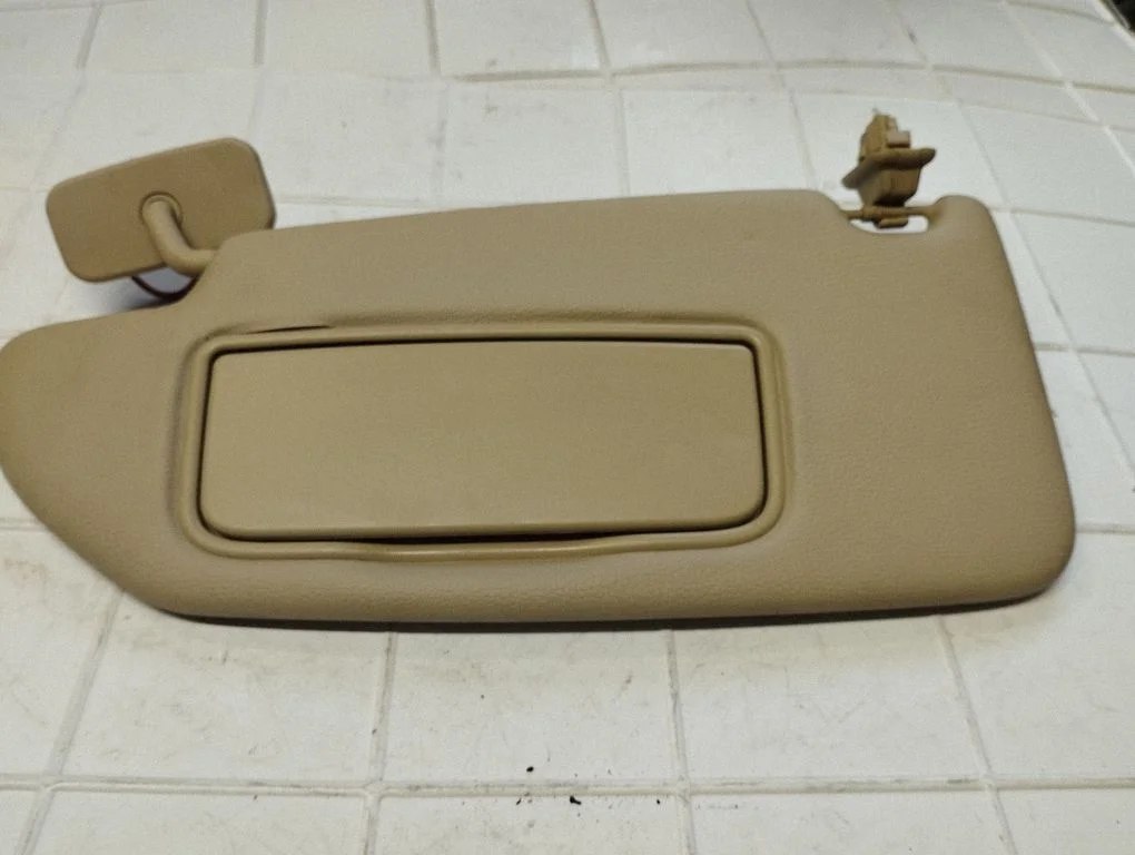 Sun visor – left