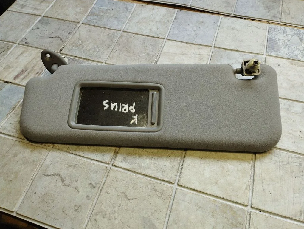 Sun visor – left
