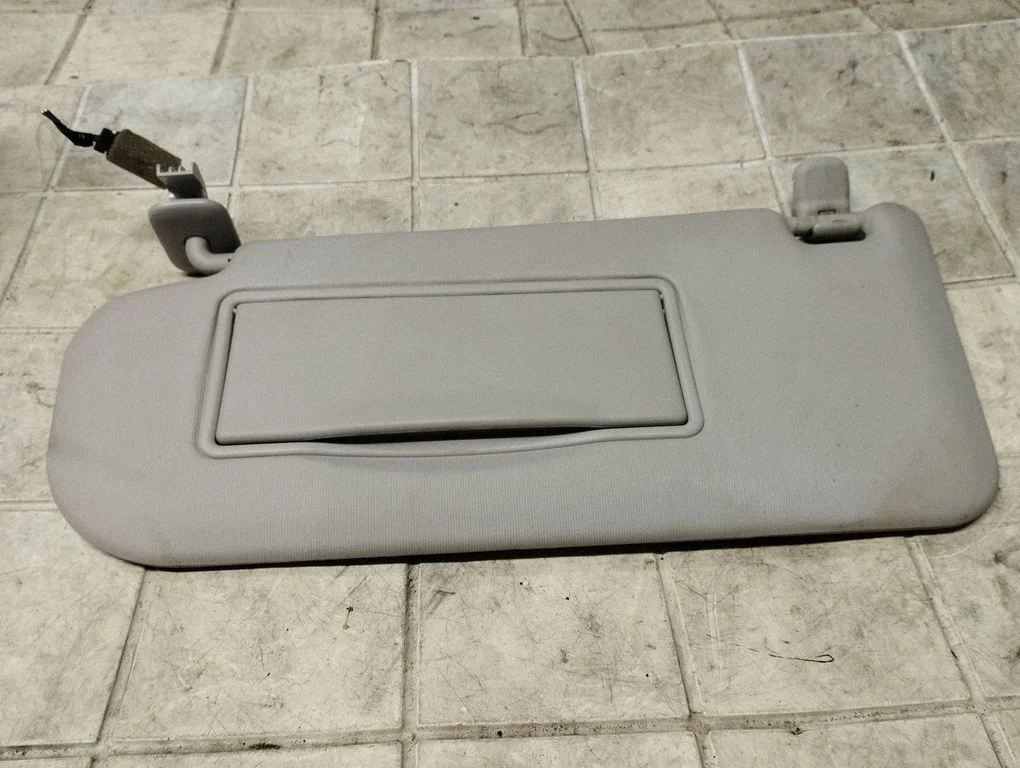 Sun visor – left