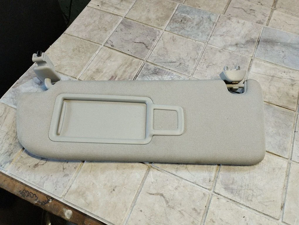 Sun visor – left