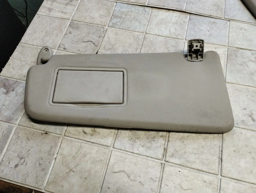 Sun visor – left