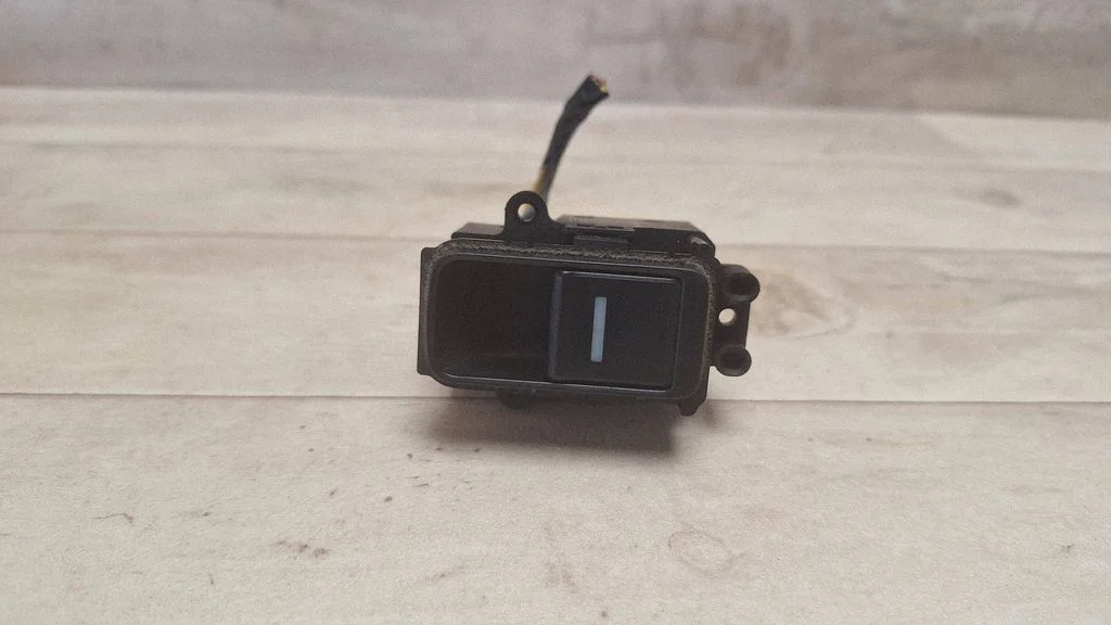 Electric window control switch – rear left