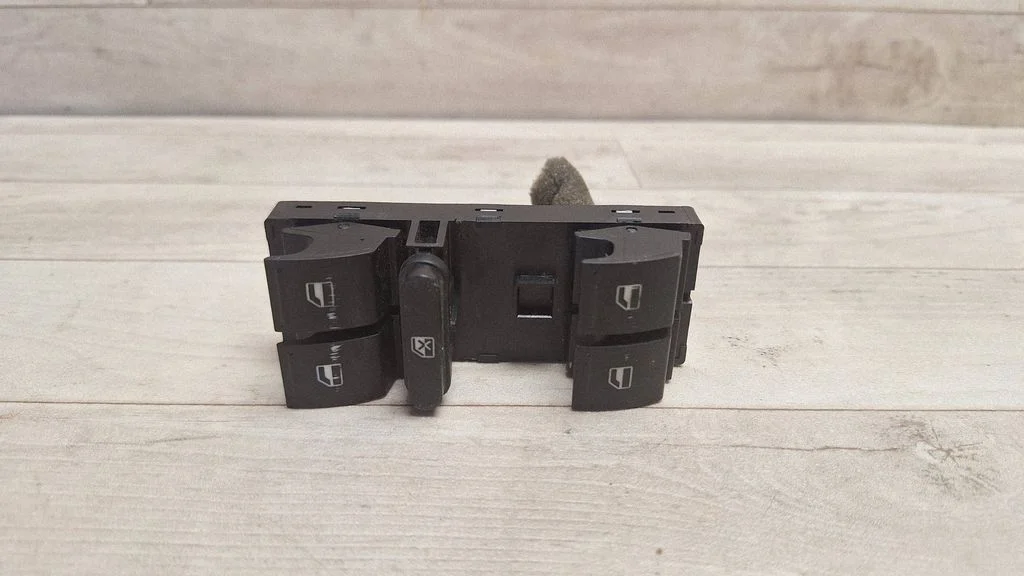 Electric window control switch – front left