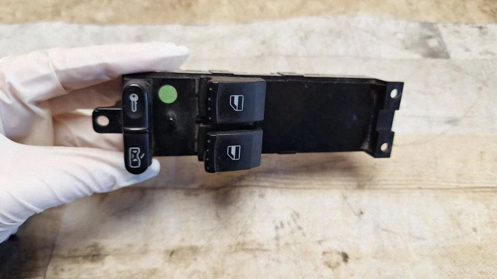 Electric window control switch – front left
