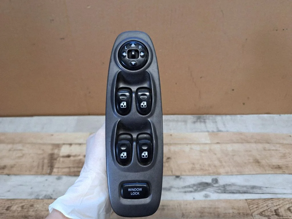 Electric window control switch – front left