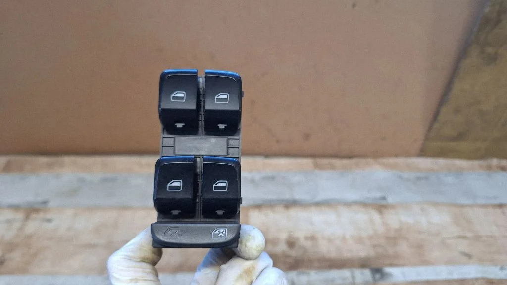 Electric window control switch – front left
