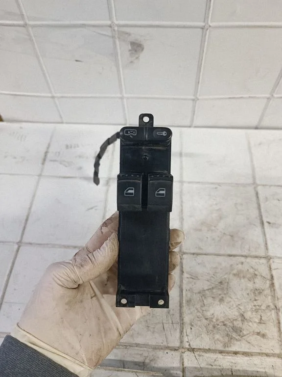 Electric window control switch – front left