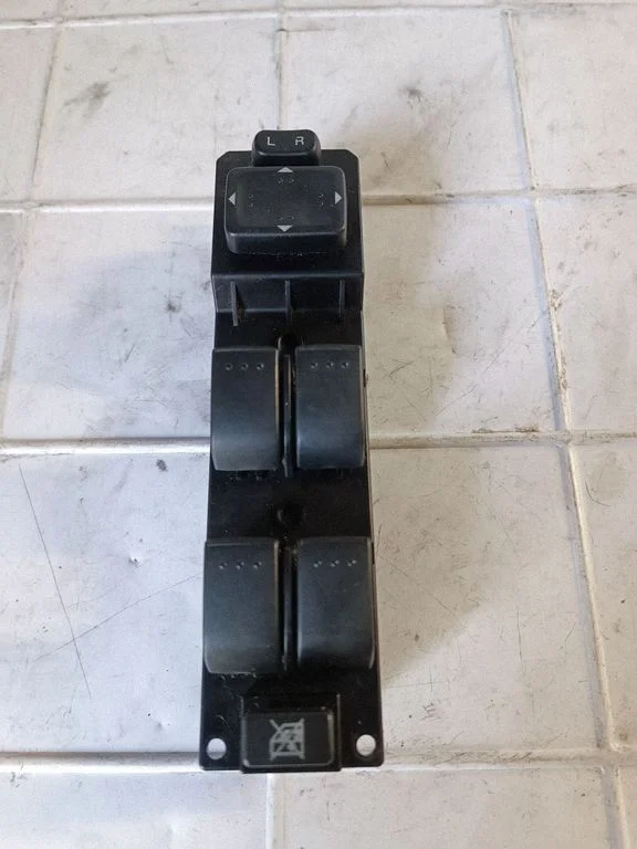 Electric window control switch – front left
