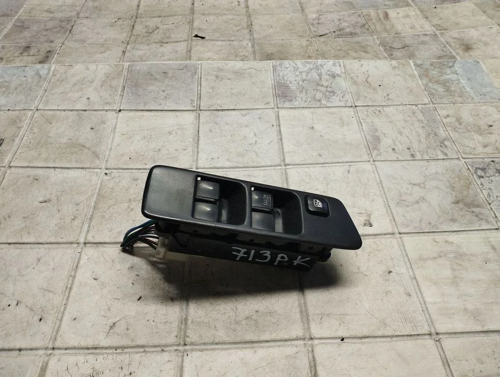 Electric window control switch – front left