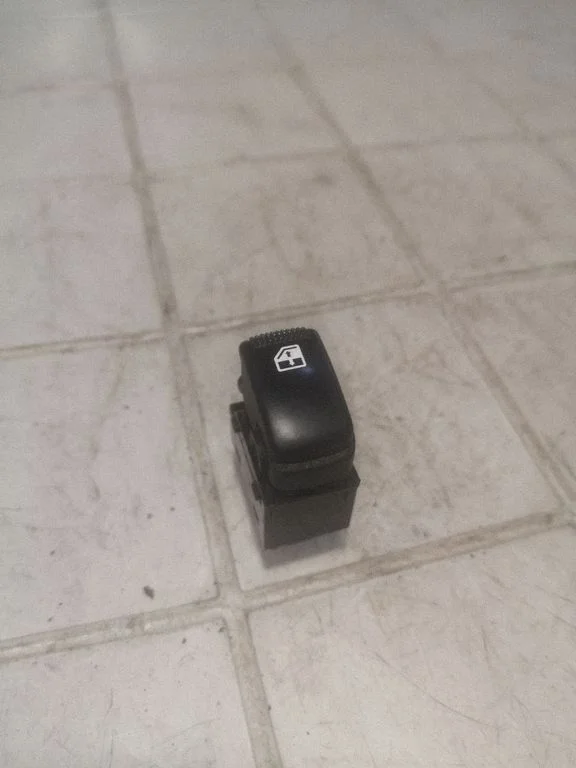 Electric window control switch – rear left